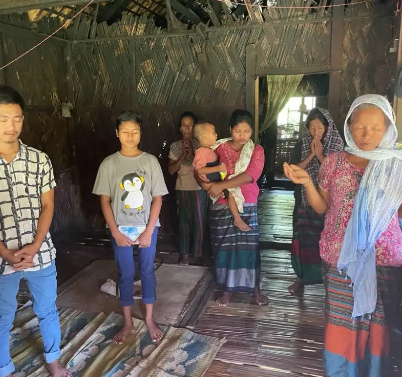 House Visit & prayer in a Home in Miao Diocese